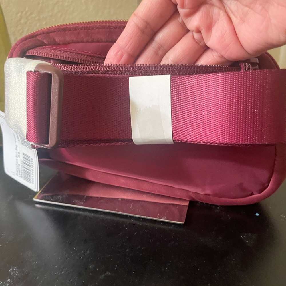 NWT Lululemon wine berry  Crossbody / belt bag .Limited edition  out of stock🎈 - Picture 8 of 9